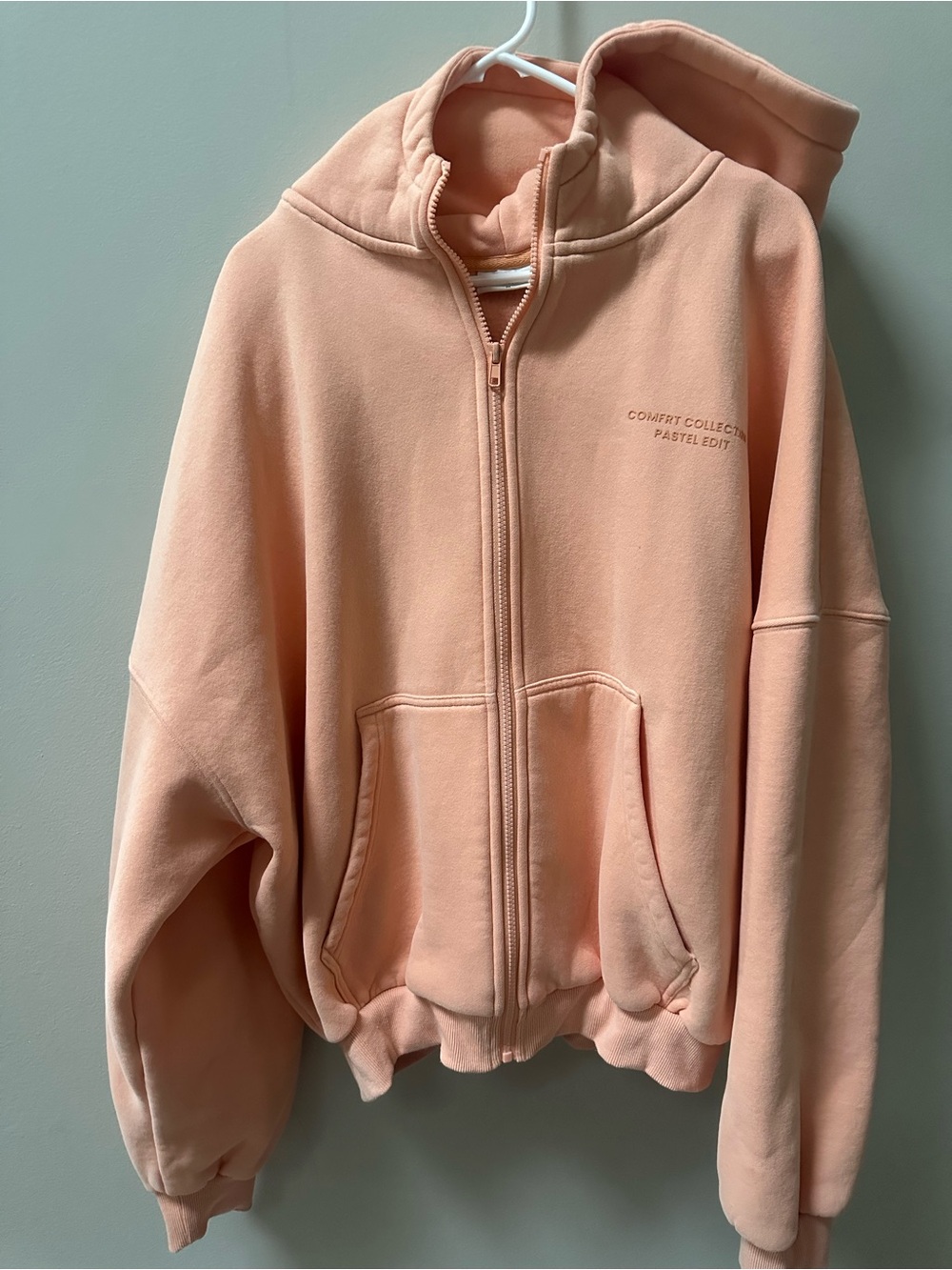 Pastel Peach Full-Zip Hoodie with Subtle Chest Embroidery